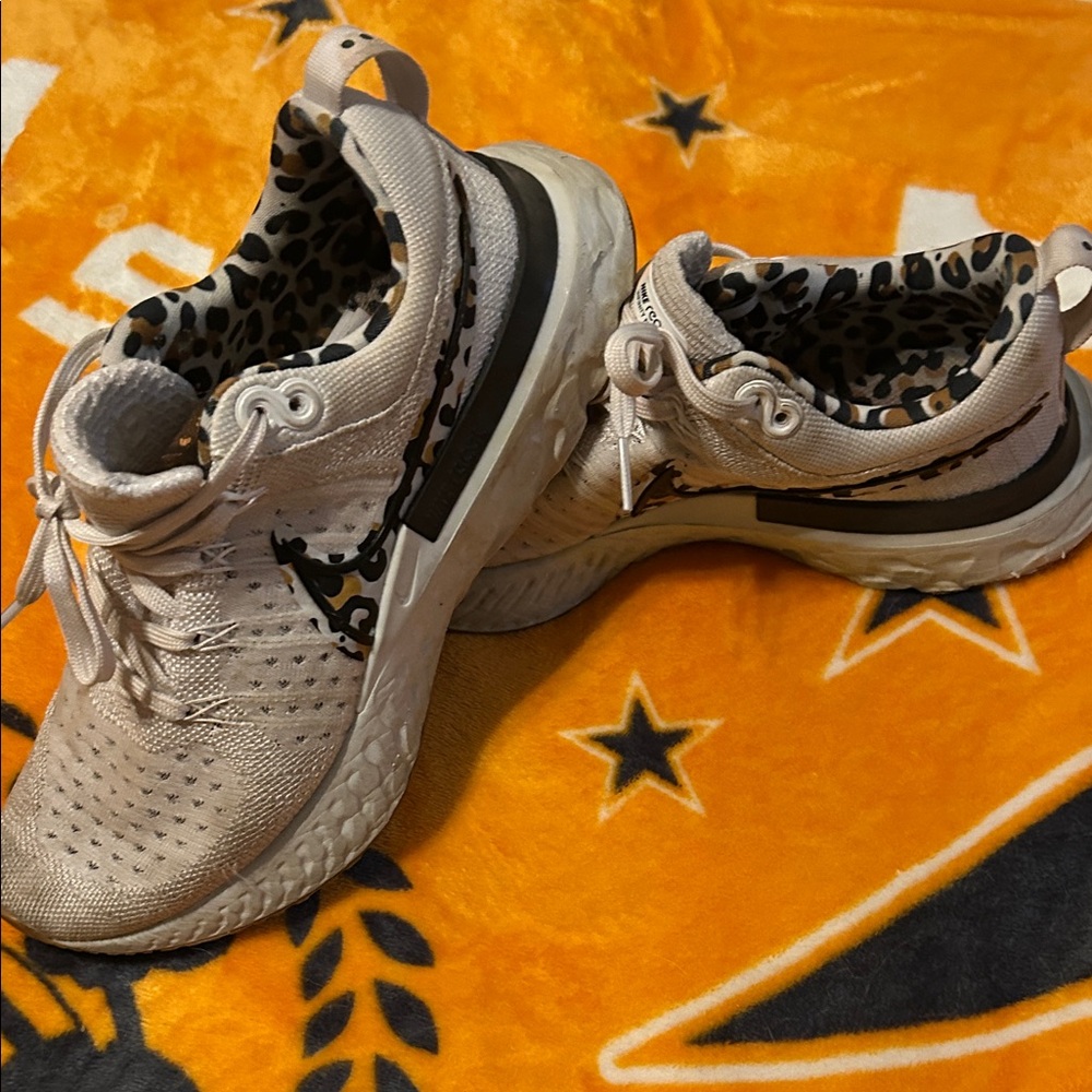 Nike Cream and Black Athletic Shoes with Leopard Print